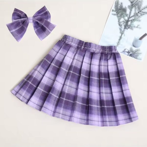 faldas moradas de cuadros de niña